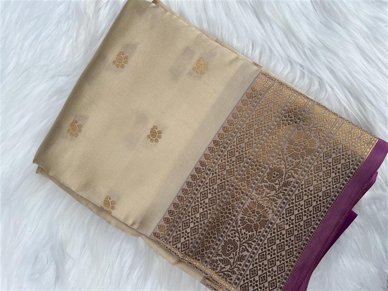 Beige Silk Saree with Gold Zari Buddas and Plum Border