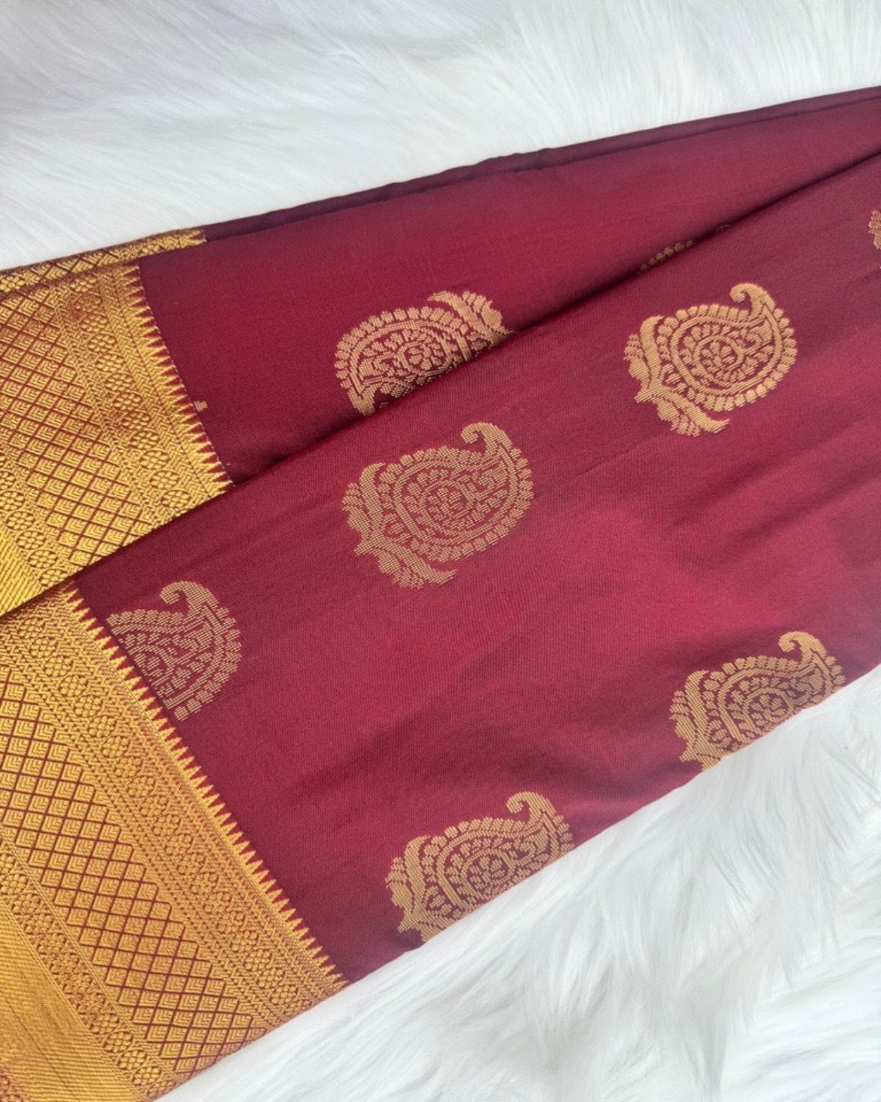 Maroon Semi-Silk Saree Featuring Gold Motifs