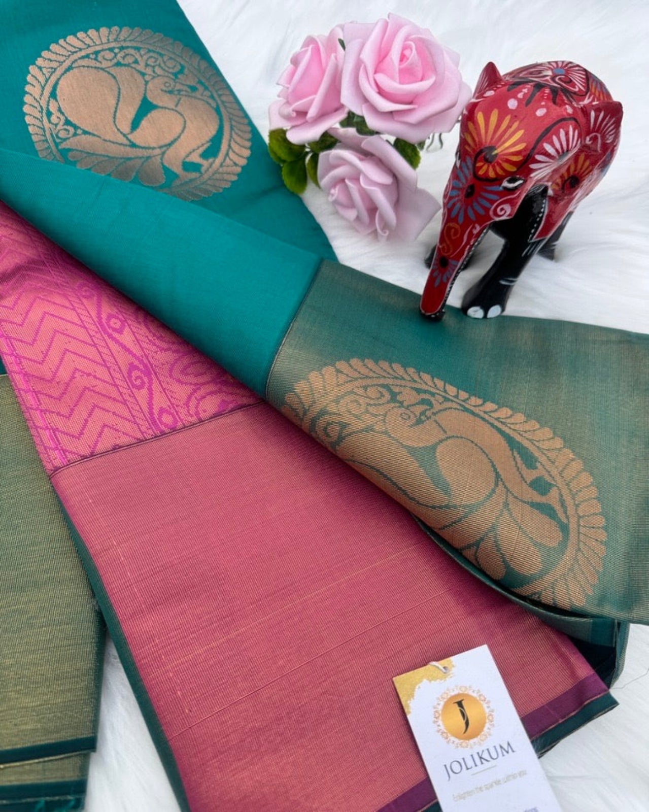Teal Semi-Silk Saree with Dark Green Border and Peacock Motifs