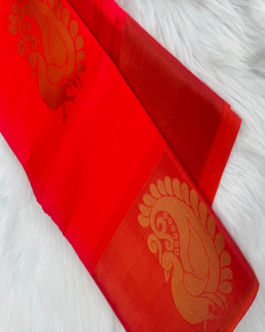 Orange Semi-Silk Saree with Peacock Motifs