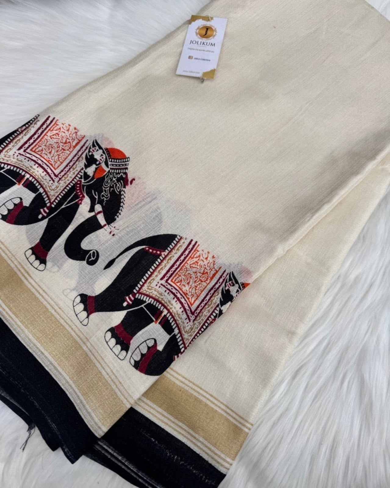 Graceful White Kasavu Saree with Detailed Elephant Border