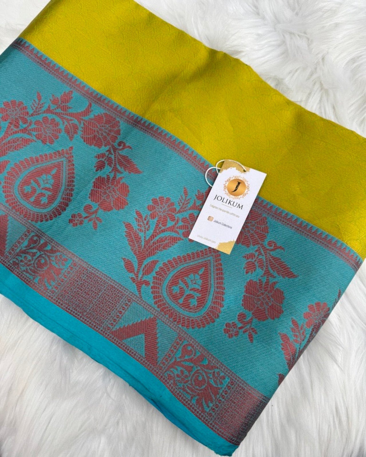 Green Semi Silk Sari with Bold Blue Border and Rose Gold Details