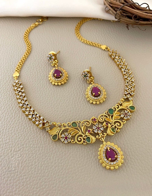Elegant Gold Necklace with Matching Earrings