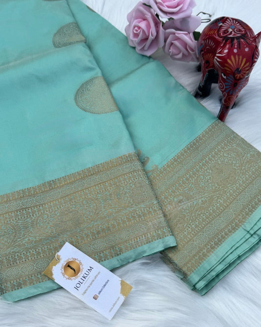 Teal Semi-Silk Saree with Gold Border and Buddha Motifs