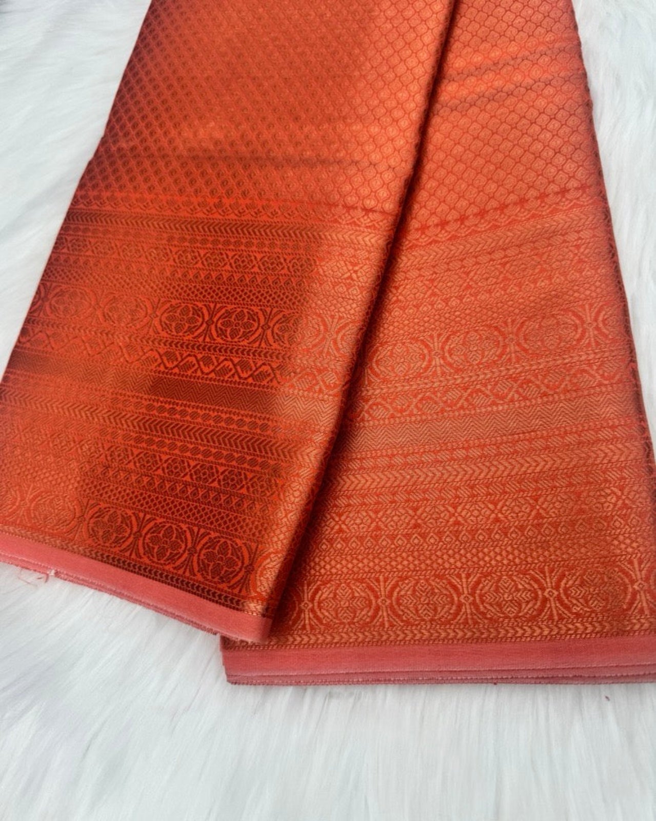 Classic Orange Saree with Intricate Copper Border