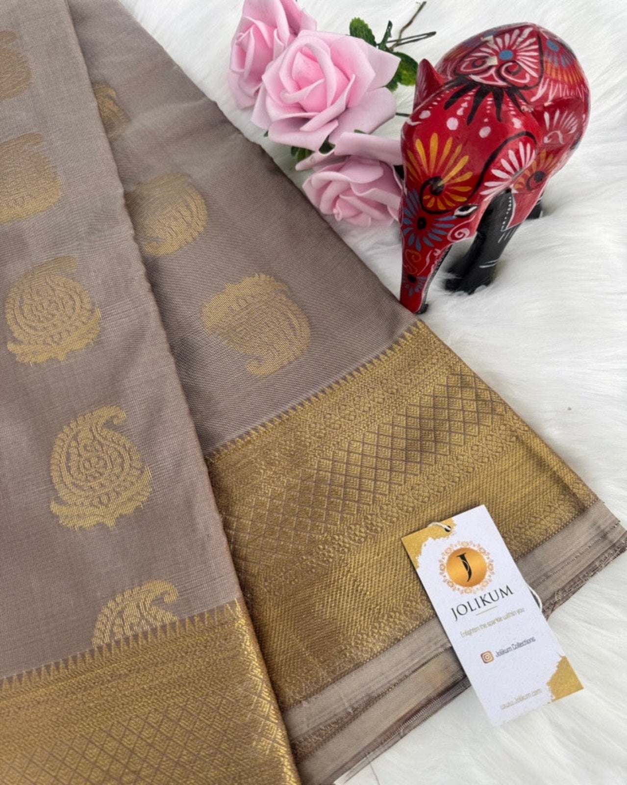 Greyish Nude Semi-Silk Saree with Gold Border and Buddha Motifs