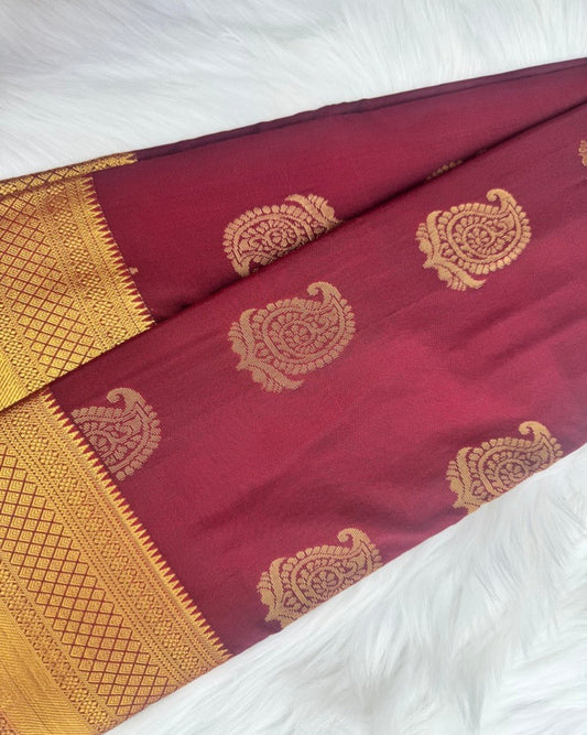 Maroon Semi-Silk Saree Featuring Gold Motifs
