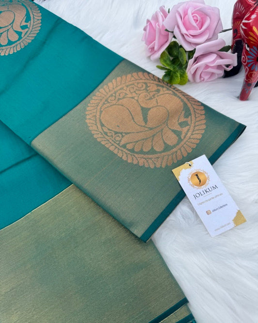 Teal Semi-Silk Saree with Dark Green Border and Peacock Motifs